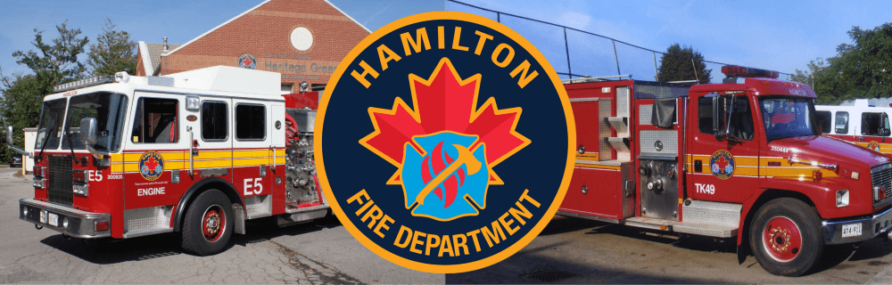 Two fire trucks with Hamilton Fire Department logo