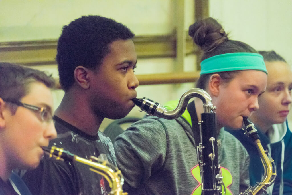 Students play music in Experiential Learning Day in the Arts.