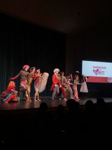 Clowns performing a skit on stage