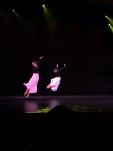 Students dancing on stage