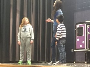 two students and one performer
