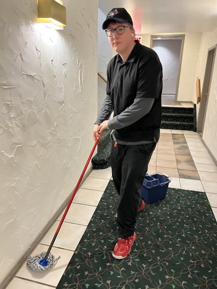 Student mopping