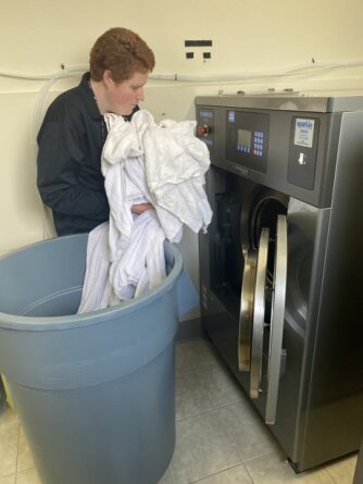 intern doing laundry
