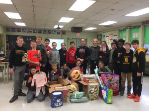 kids posing with boxes and gifts