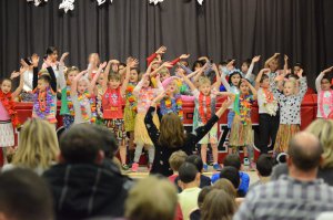 Students waving hands