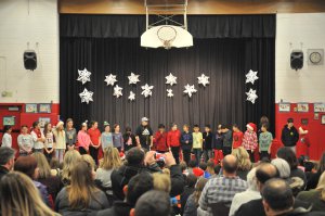 Students performing in front of a croud