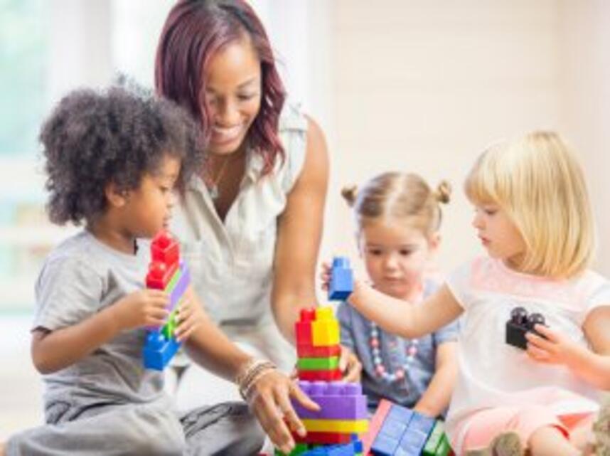children playing with adult
