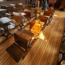 Period correct desks, restored by the Archives team