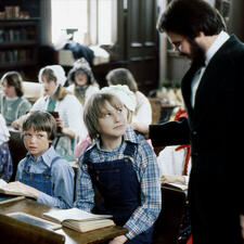 Teacher with student
