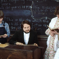 Student and teacher reading