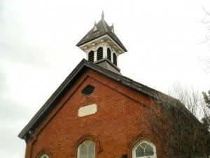 The clanging bell signals the beginning of the school day