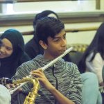Students play music in Experiential Learning Day in the Arts.