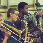 Students play music in Experiential Learning Day in the Arts.