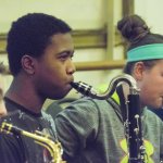 Students play music in Experiential Learning Day in the Arts.