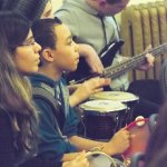 Students play music in Experiential Learning Day in the Arts.