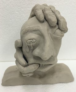 Student art showing sculpture of head 
