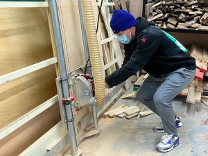 Aidan using panel saw.