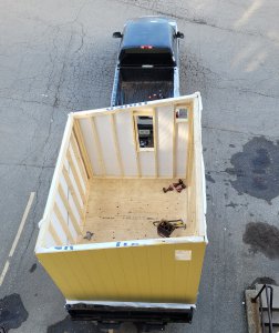 Truck with tiny home on trailor.