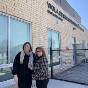 viola desmond admin team outside the school
