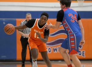 MacNab's Dyante Johnson heads up court with the ball.