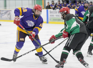 Ancaster's Cooper Couture brings the puck into the Sherwood zone.