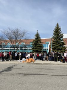 Saltfleet students cleaning up garbage during Earth Week