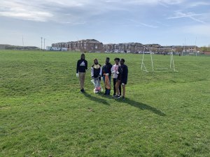 Saltfleet students cleaning up garbage during Earth Week