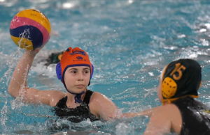 Students playing water polo 