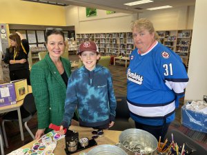 Ms. Skelly and Trustee Fehrman with student