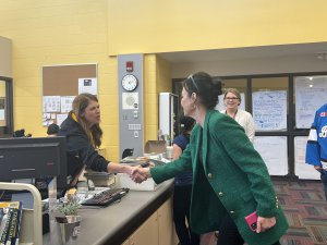 Ms. Skelly meeting staff member