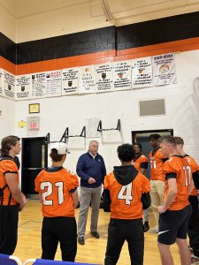 Mr. Lumsden with the boys football team