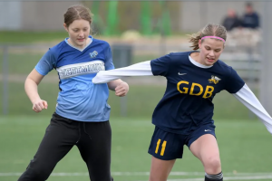 Natalie Scholtens of Guido de Brès steps in front of Westmount’s Claudia Folkens. 