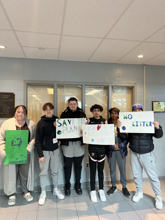 Saltfleet students holding their posters