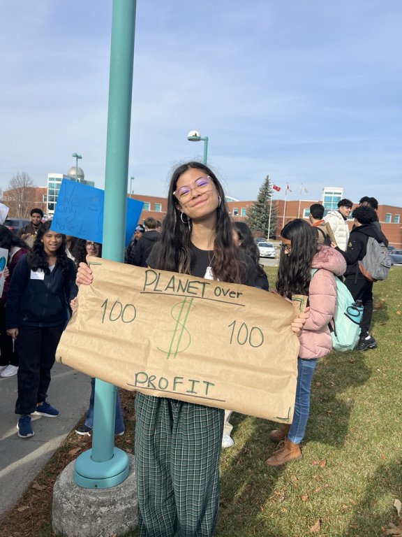 Saltfleet student holding their poster