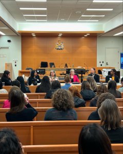 Students listening to lawyer panel at John Sopinka Courthouse