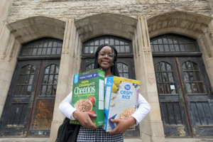 photo from westdale nutiriton spectator story with student holding cereal