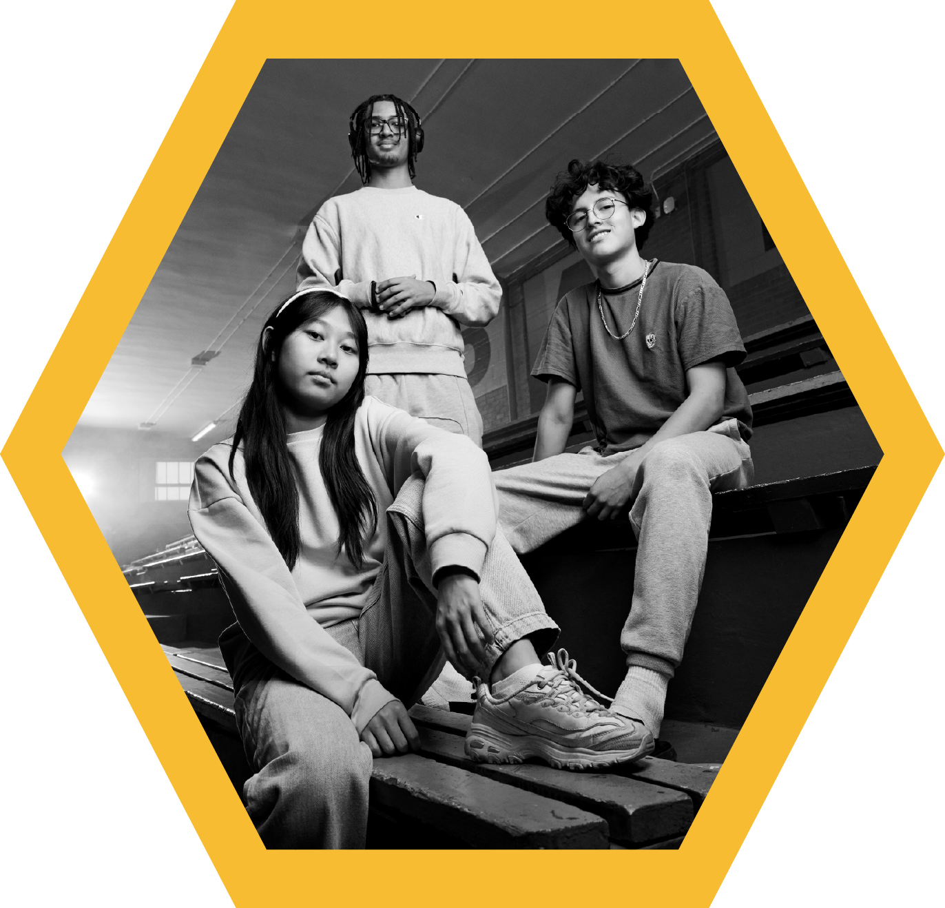 HWDSB Students sitting on benches. 